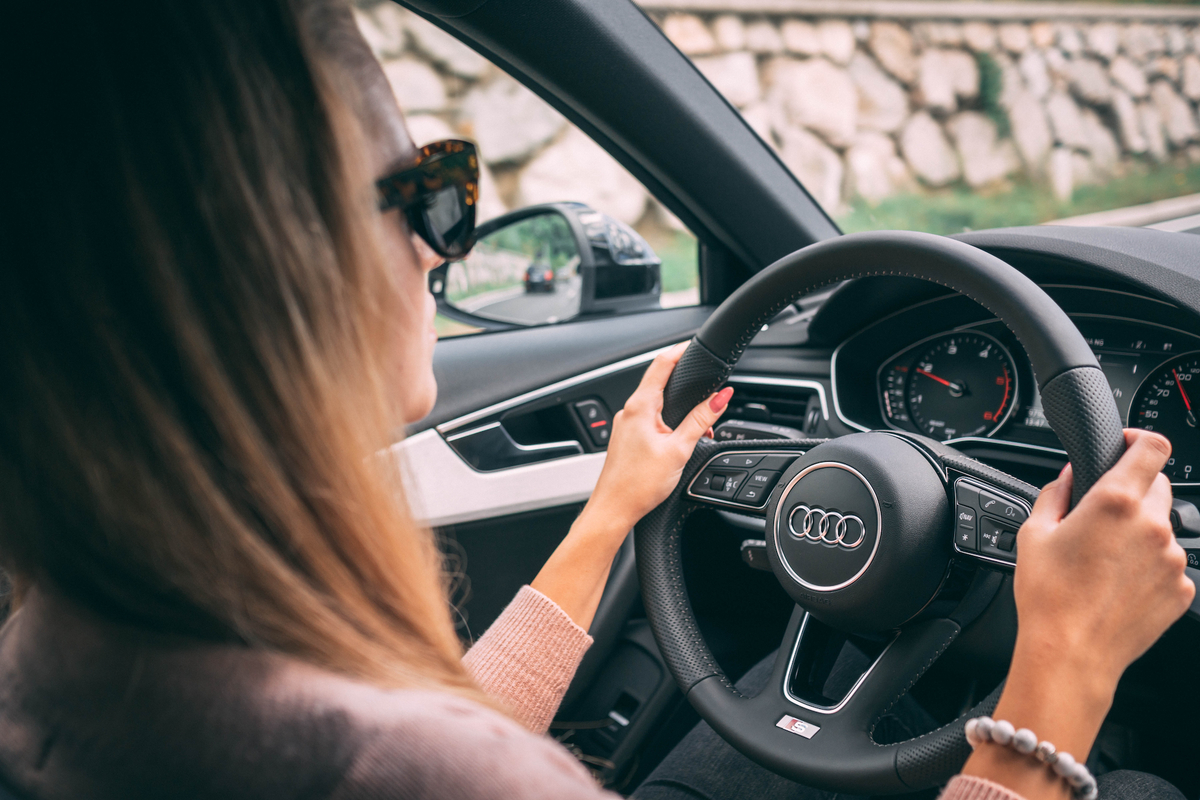 Person driving an Audi